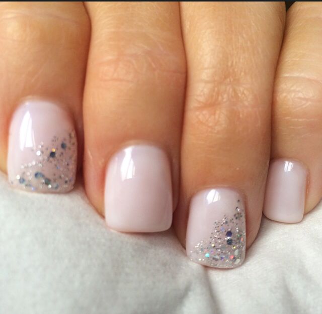 Elegant Soft Pink Manicure with Subtle Glitter Gradient and Shimmer