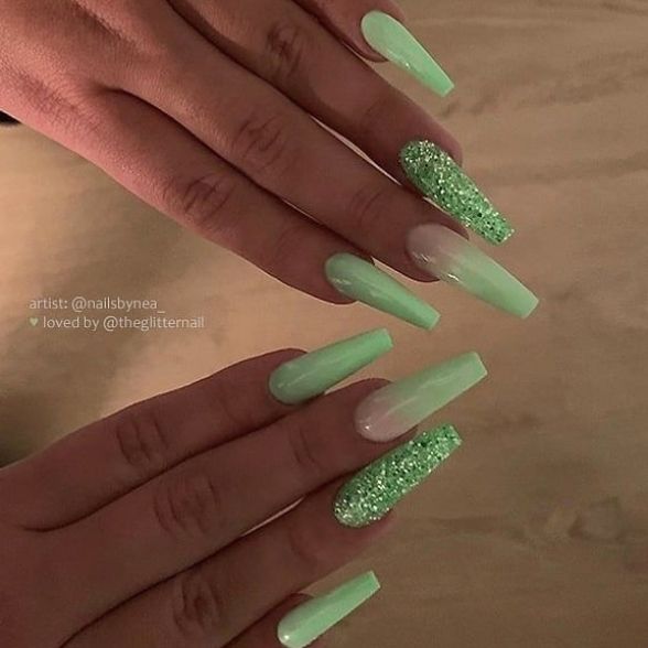 Vibrant Mint Green Coffin Nails with Glossy and Glitter Finishes.