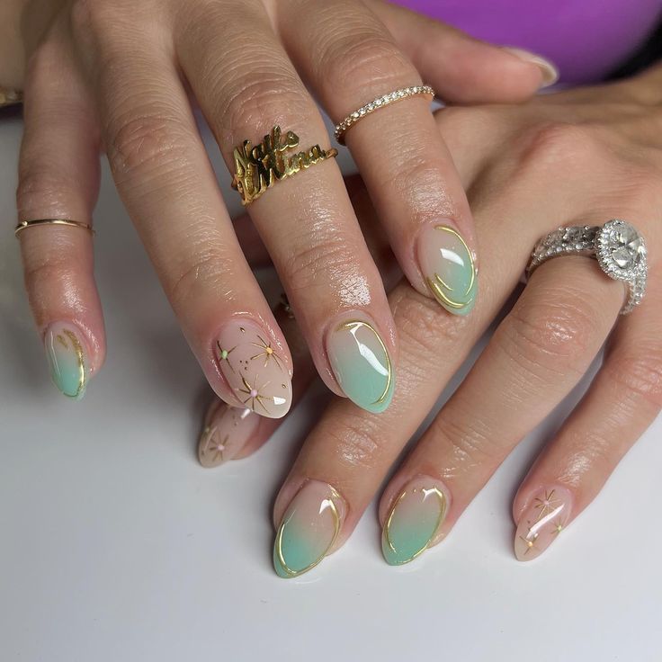 Chic Mint Green and Nude Gradient Nail Design with Golden Accents