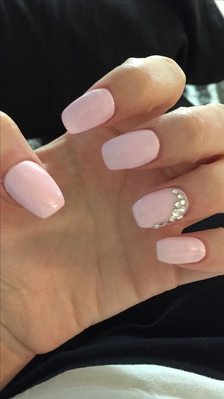 Chic Elegant Pink Nail Design with Glossy Finish and Glamorous Rhinestone Accent.