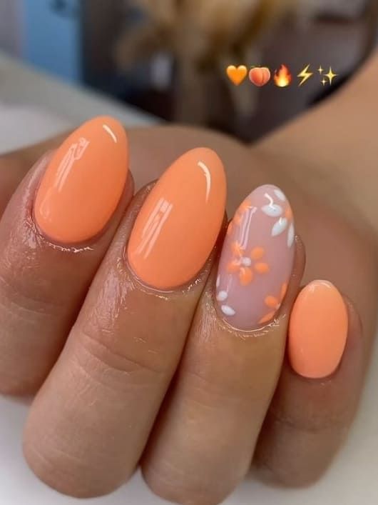 Cheerful Bright Orange Nails with Elegant Lavender Floral Accent.