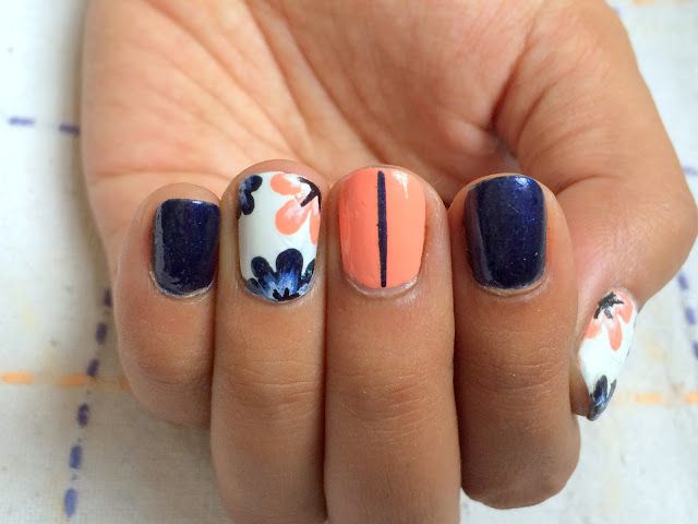 Vibrant Floral Nail Design with Modern Vertical Lines and Elegant Color Harmony.