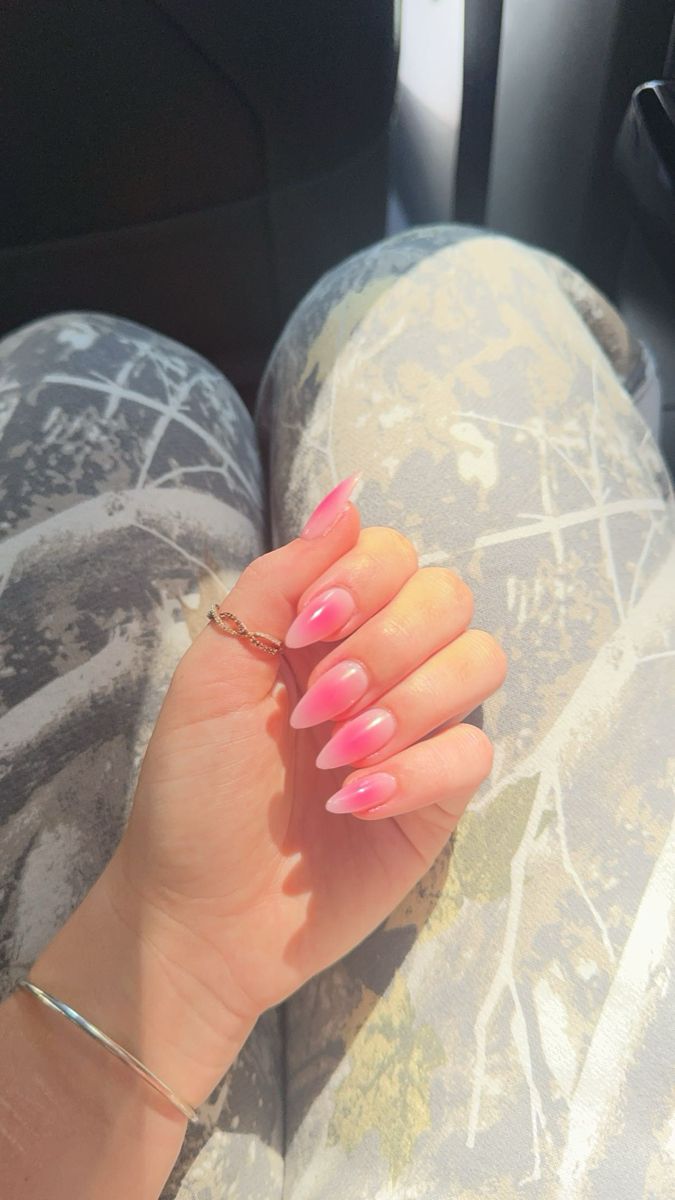 Sophisticated Ombre Stiletto Nails in Soft Pink with Contemporary Silver Ring Accent.