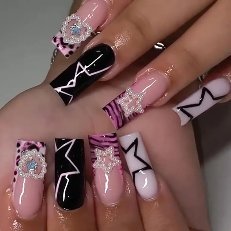 Chic Nail Design: Intricate Patterns with Glossy Black, Soft Pink, and Rhinestone Embellishments