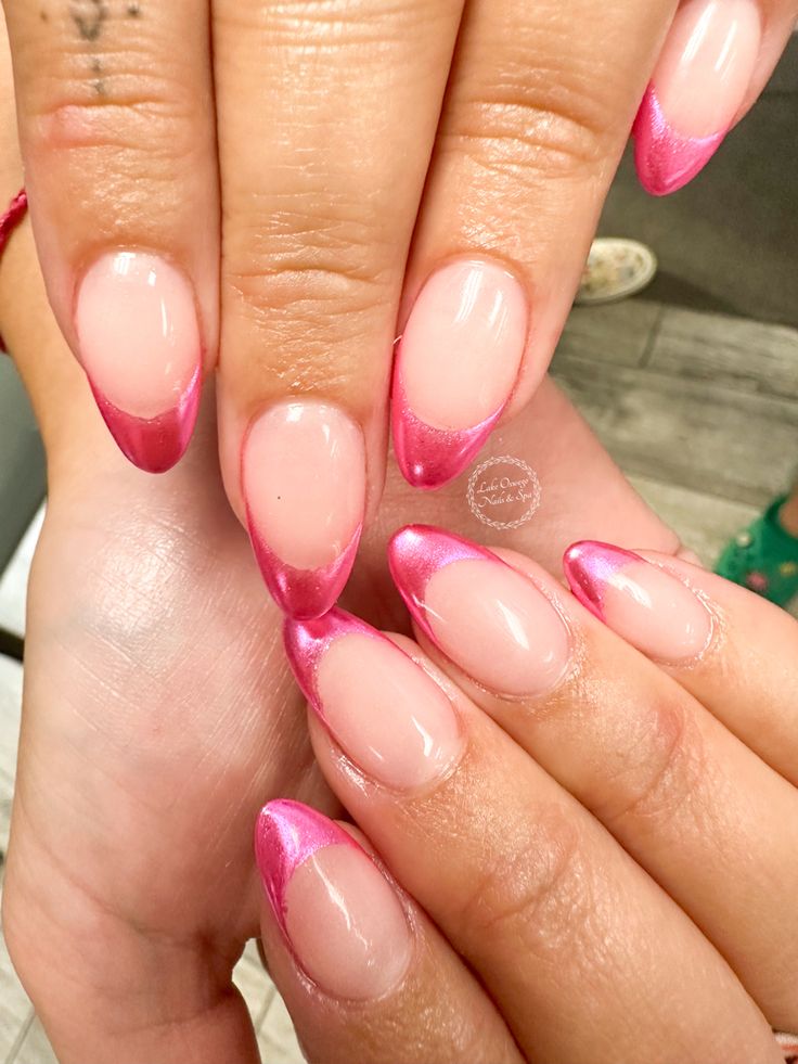 Elegant Ombre Nail Design with Glossy French Tips in Soft Pink and Vibrant Shades.