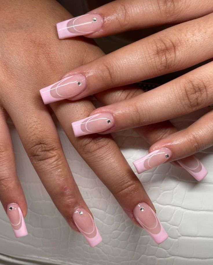 Chic Elegant Pink Nail Design with Glossy Tips and Delicate White Line Art Enhanced by Subtle Rhinestones.