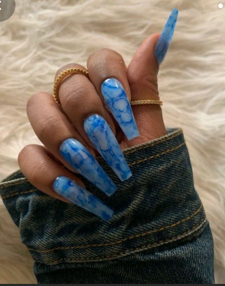 Chic Blue Marble Nail Design with Pointed Tips and Gold Accents