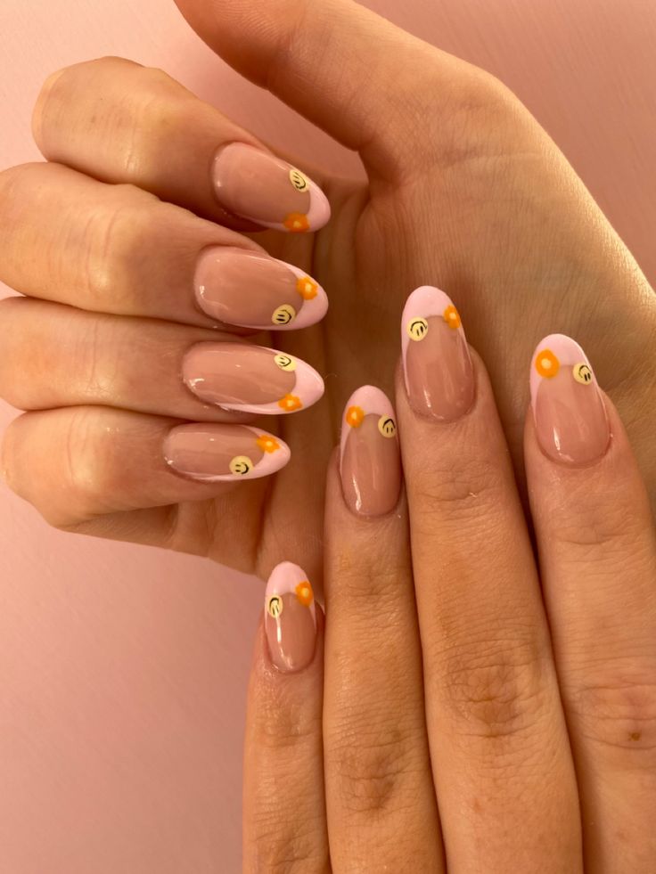 Whimsical Pink Tip Nail Design with Smiley Faces and Dots