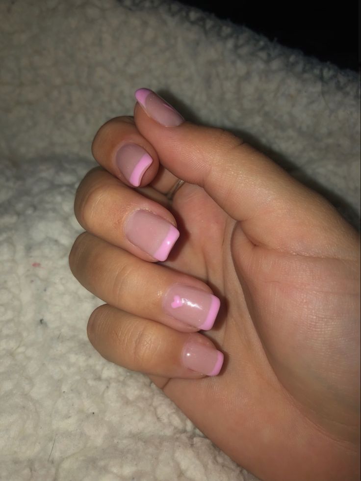 Elegant Soft Pink French Tip Nail Design with Nude Base