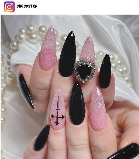 Dramatic Almond-Shaped Nail Design with Matte Black, Glittering Pink, and Edgy Monochrome Accents