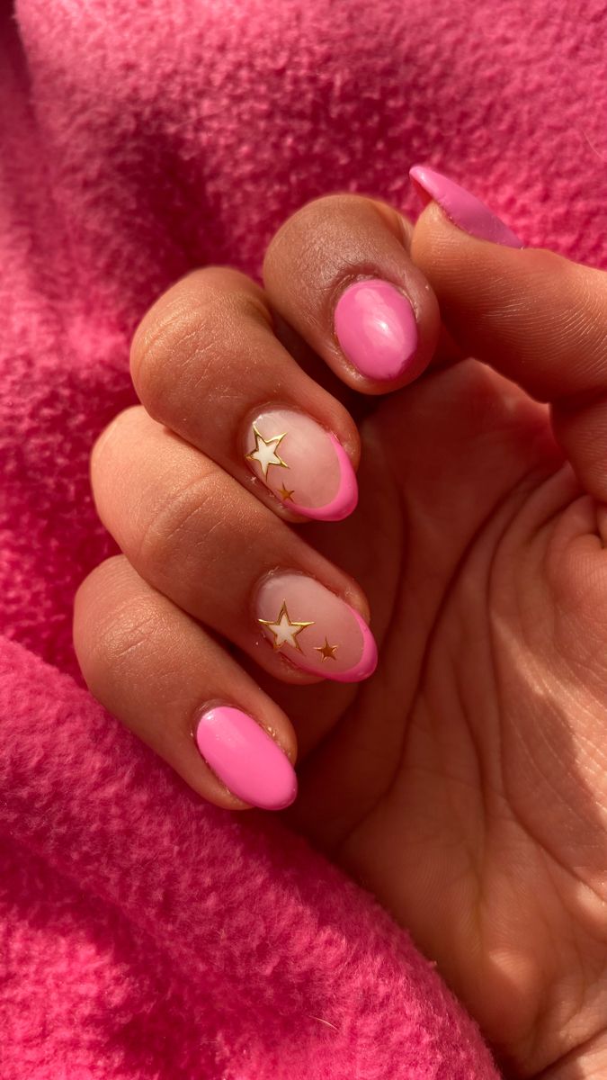 Cheerful Vibrant Pink Nail Design with Glossy and Matte Finishes and Gold Star Accents