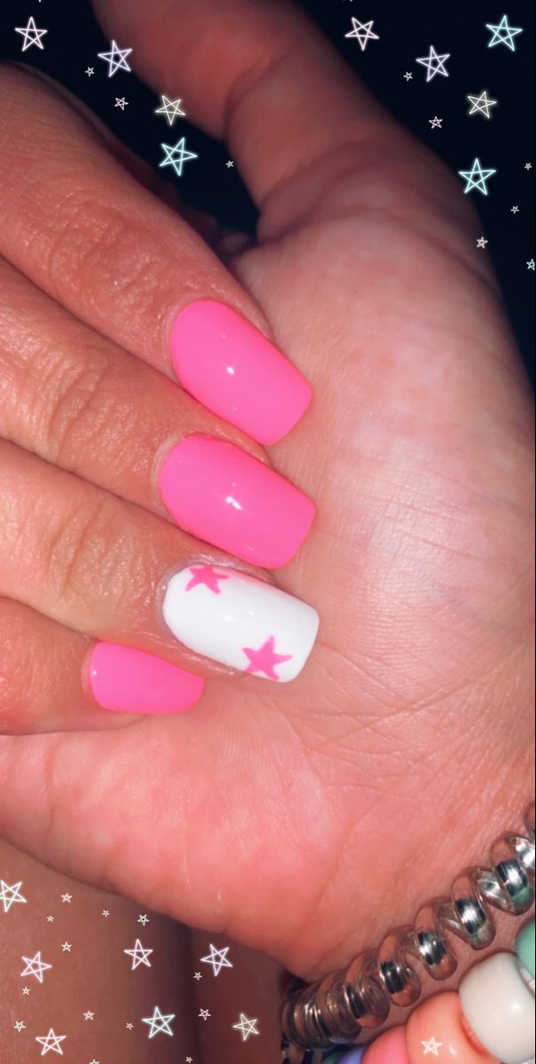 Cheerful Glossy Pink Nail Design with Whimsical White Star Accent.