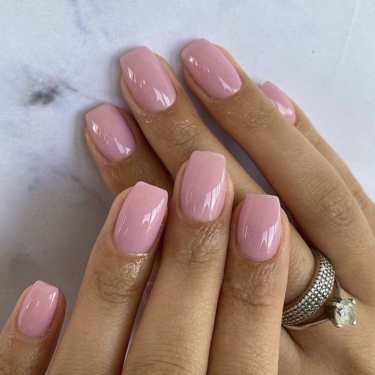 Sophisticated Glossy Pink Nail Design for Understated Elegance.