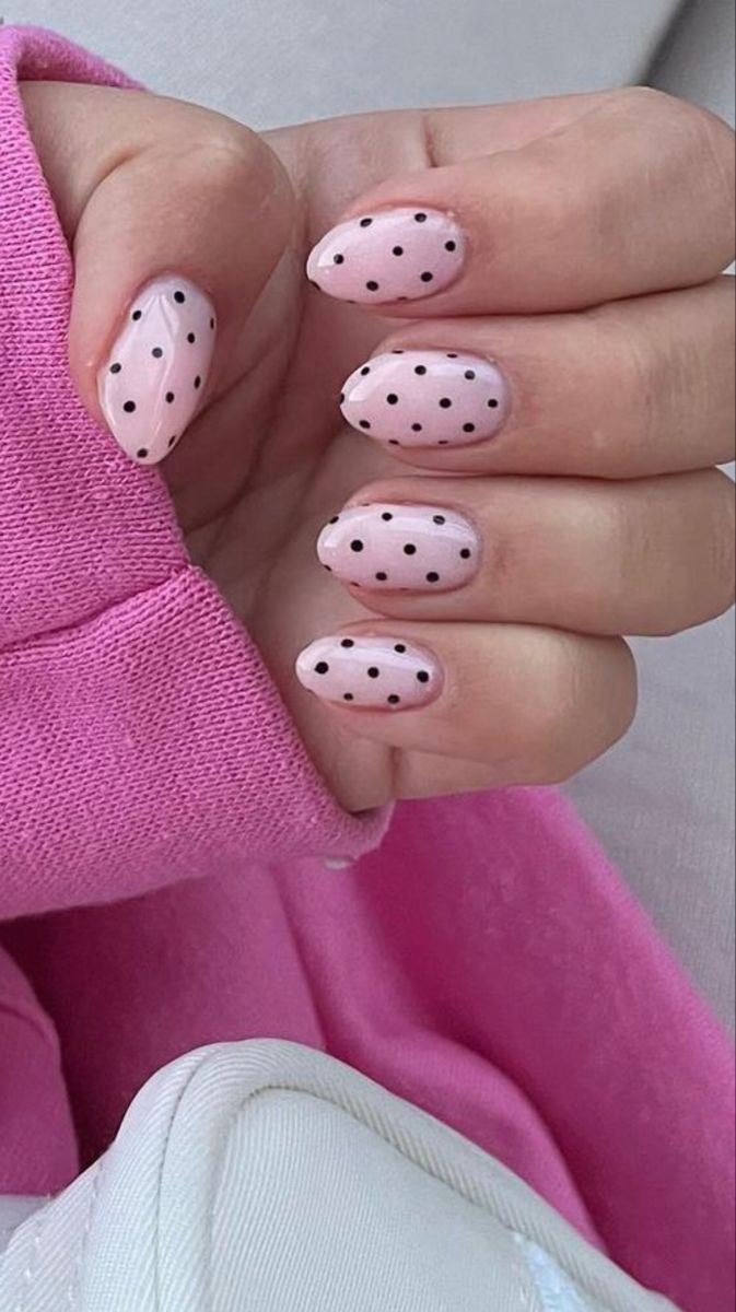 Chic Soft Pink Polka Dot Nail Design: A Playful Touch for Any Outfit.