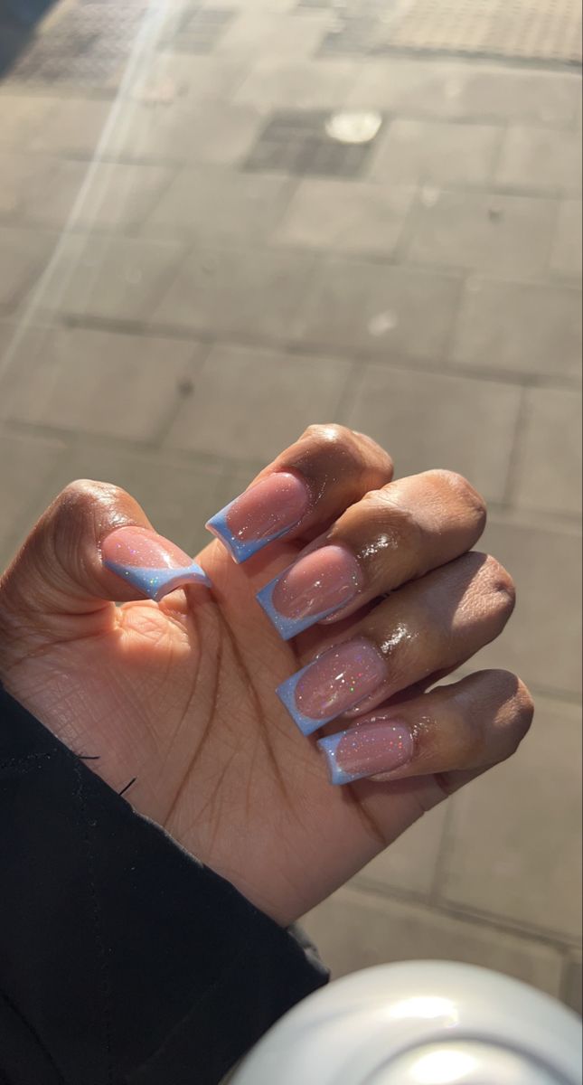 Chic Nude and Baby Blue Nail Design: Glossy Finish with Subtle Sparkle