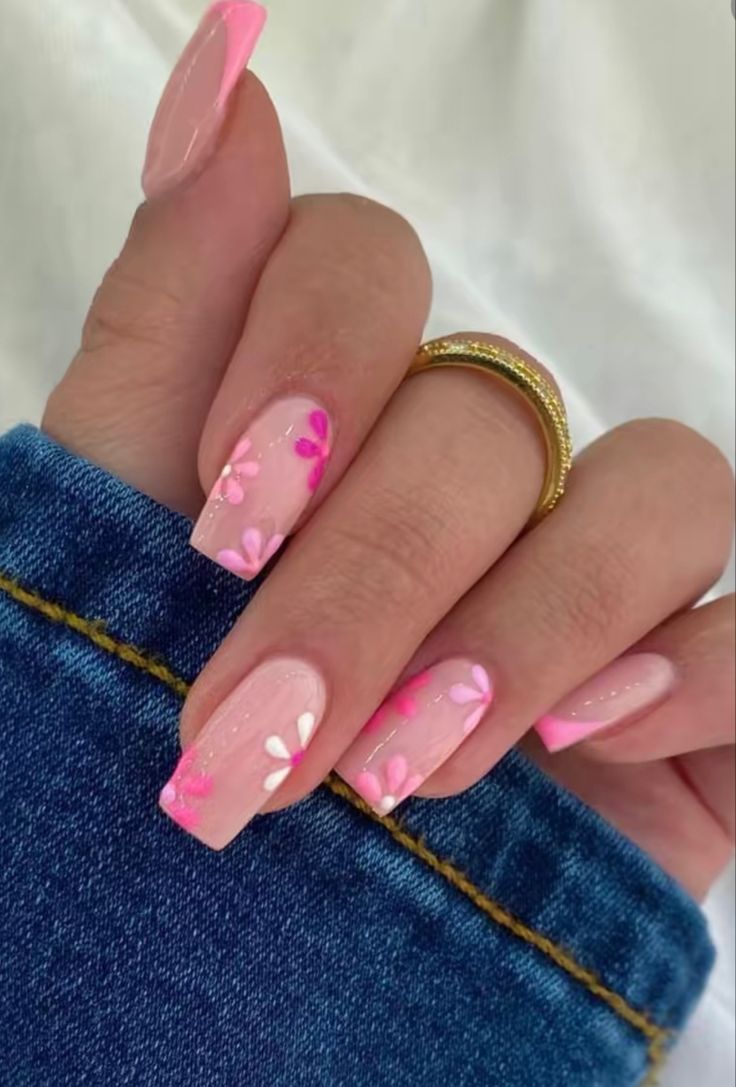 Charming Floral Nail Design: Soft Pink Base with Pastel Flower Accents