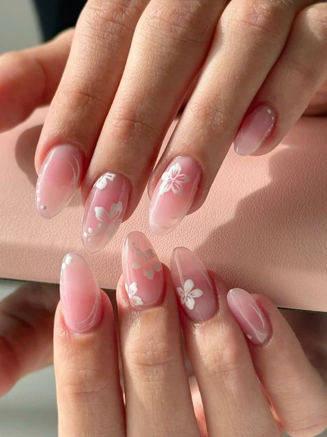 Chic Delicate Floral Nail Design with Soft Pink Ombre and Glossy Finishes.