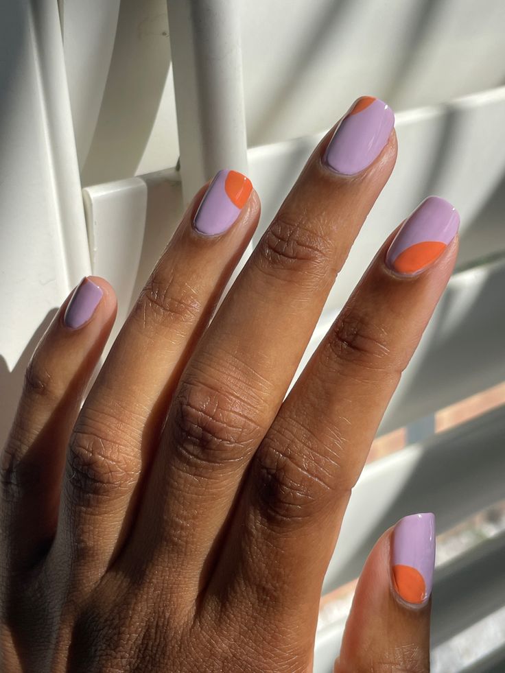 Vibrant Lavender and Bright Orange Geometric Nail Design for a Stylish Statement