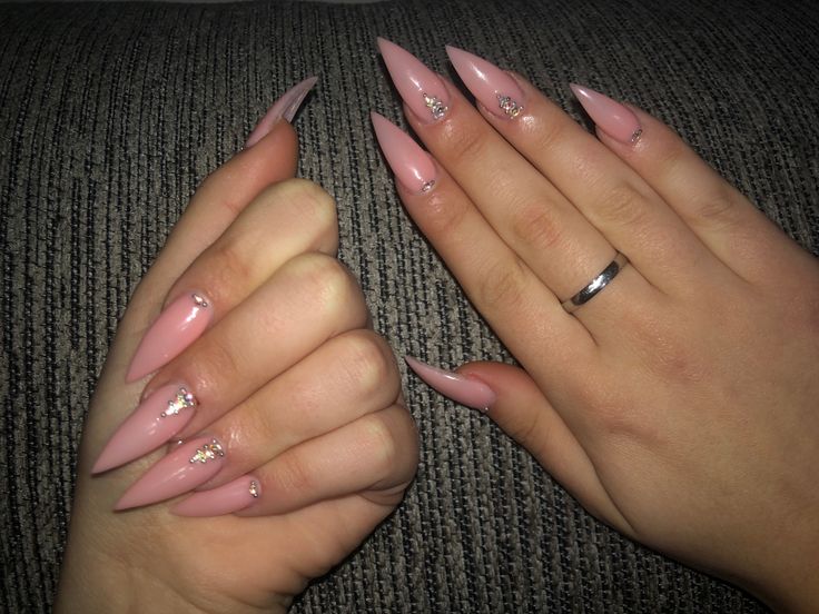 Chic Almond-Shaped Nails in Soft Pink with Glamorous Touches for Every Occasion