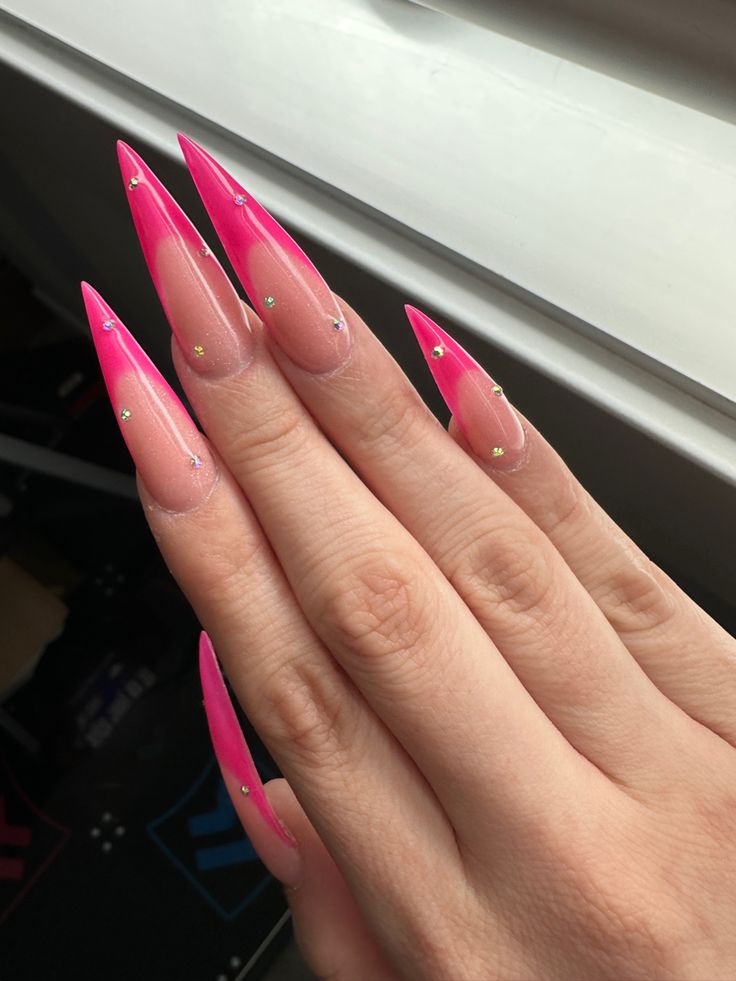 Chic Ombre Pink Nail Design with Elegant Gold Accents