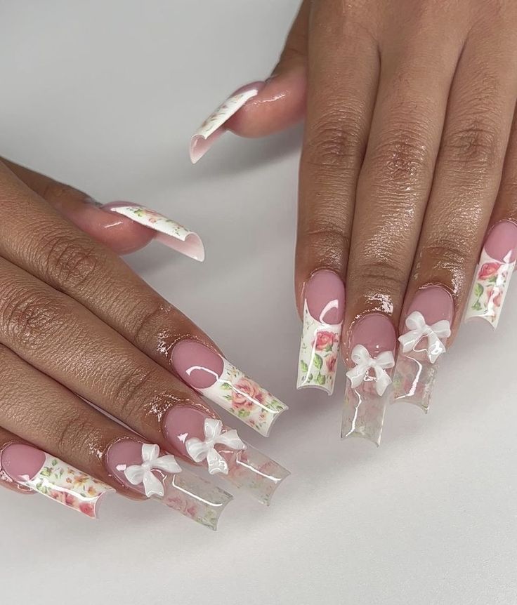 Elegant Floral Nail Design with Pink and Clear Accents