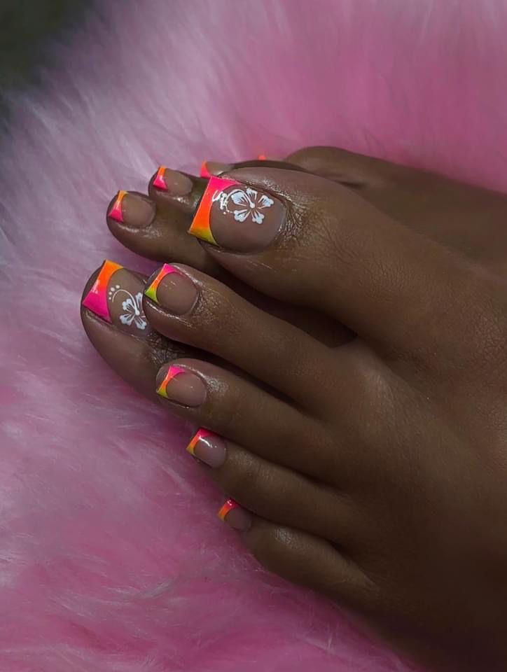 Playful Summer Toenail Design with Vibrant Gradient and Elegant Floral Patterns