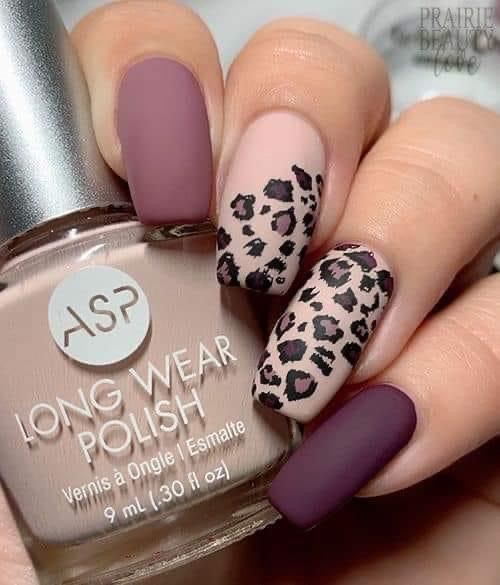 Chic Nail Design: Matte and Glossy Mauve with Leopard Print Accent for Elegant Statement.