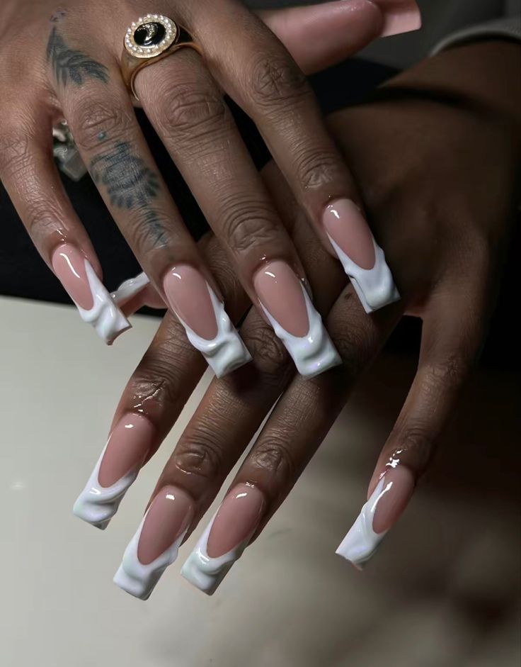 Elegant Nude Long Square Nail Design with Striking White Three-Dimensional Accents.