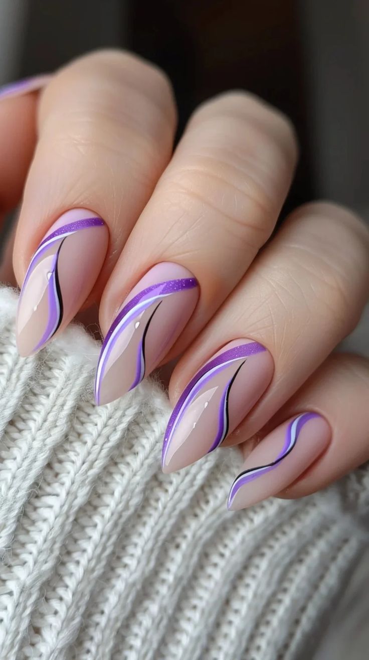 Sophisticated Soft Pink and Purple Wavy Nail Design with Glossy and Matte Finishes.