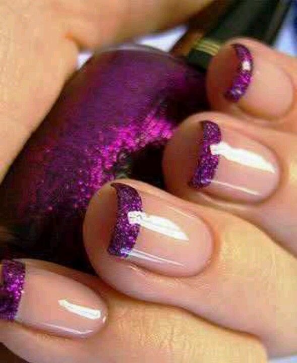 Elegant French Tip Nail Design with Sparkling Purple Glitter Accents for Any Occasion.