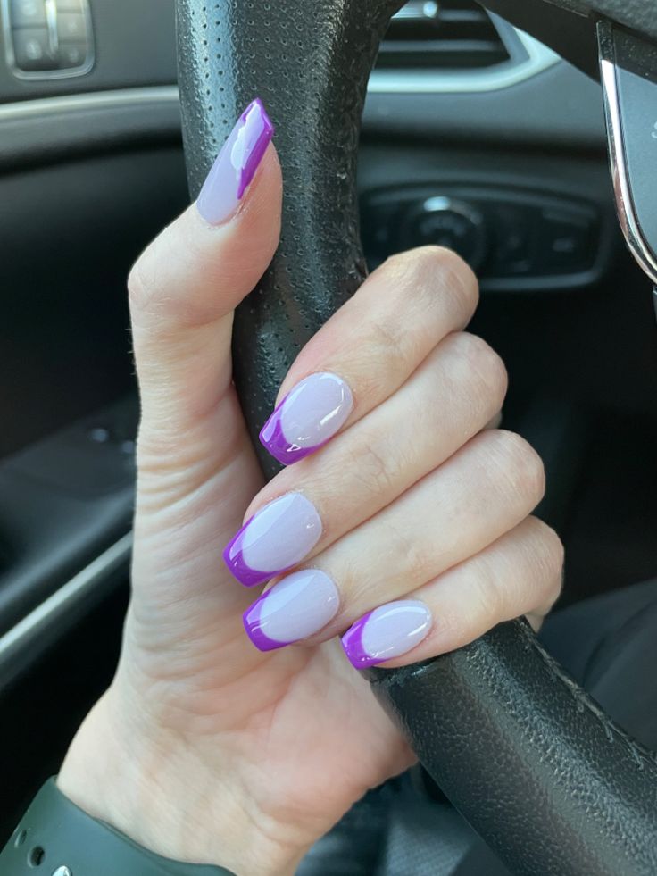 Chic Lavender and Purple French Tip Nail Design: A Stylish Blend of Elegance and Modernity.