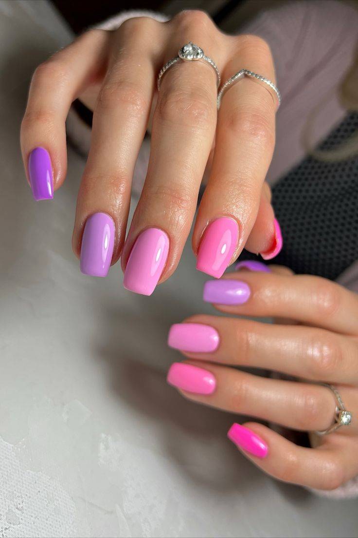 Vibrant Purple and Pink Alternating Nail Design with Glossy Finish