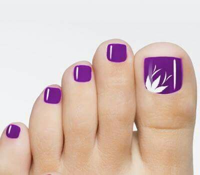 Elegant Purple Toenail Design with Floral Accents for a Refreshing Summer Look.