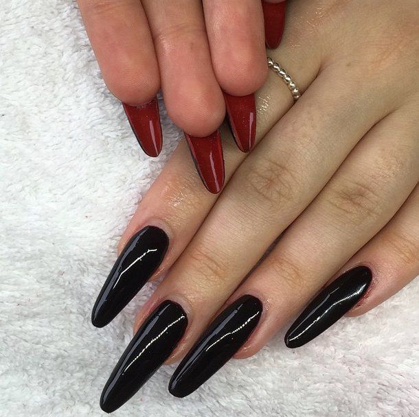 Dramatic Almond-Shaped Nail Design in Glossy Black and Vibrant Red.