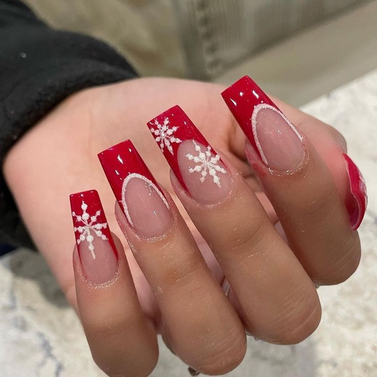 Cheerful Winter Themed Nails Showcase Intricate Snowflakes and Modern Square Tips for Seasonal Festivities.