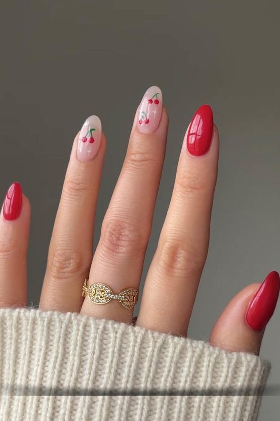 Playful Cherry-Themed Nail Design: Bold Red Meets Elegant Nude with Whimsical Artwork