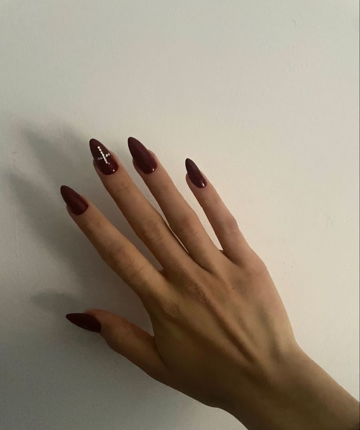 Chic Burgundy Almond Nails: A Perfect Blend of Elegance and Sparkle