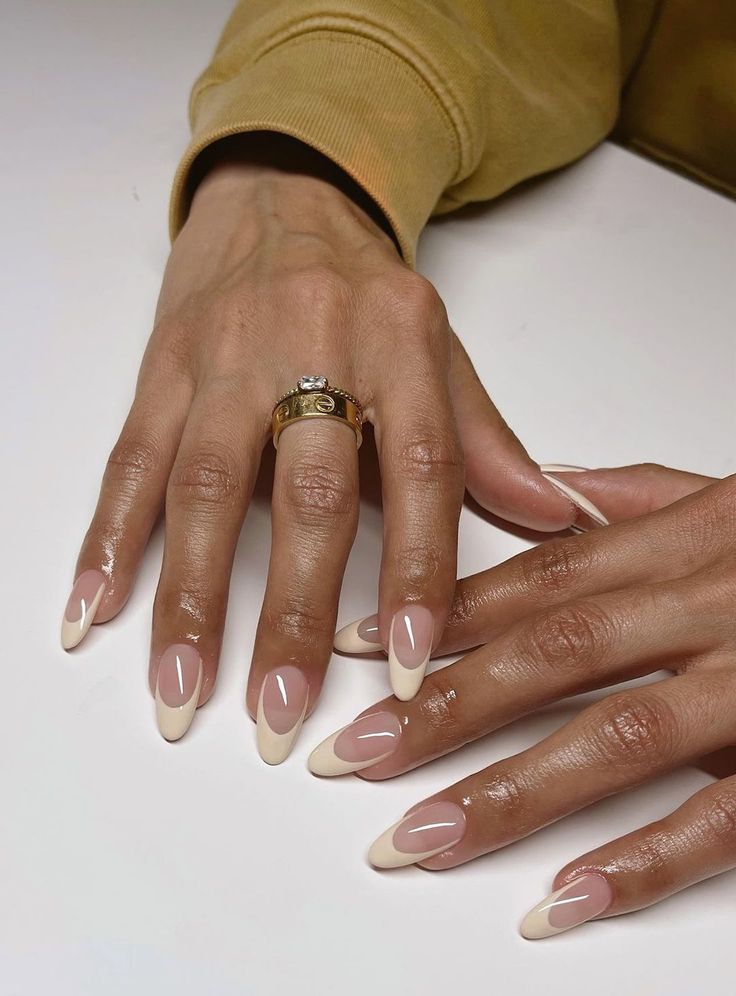 Sophisticated Modern French Tip Nail Design with Chic White Tips on a Soft Nude Base