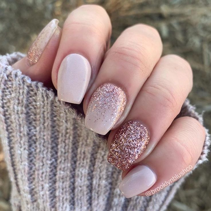 Elegant Nude Nail Design with Sparkling Rose Gold Accents for a Chic Touch of Glam.