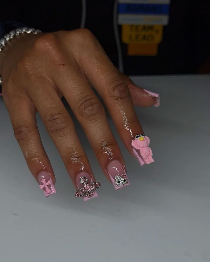 Whimsical Soft Pink Nail Design with 3D Bear and Sparkly Elements