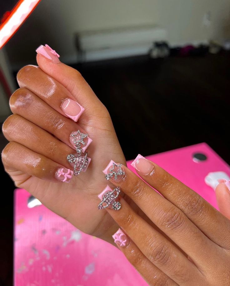 Chic Sparkling Pink Nail Design with Glossy Tips and Glamorous 3D Embellishments