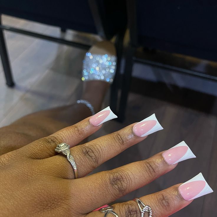 Chic Square Nail Design: Soft Pink and White Tips with Glossy Finish and Dainty Rings