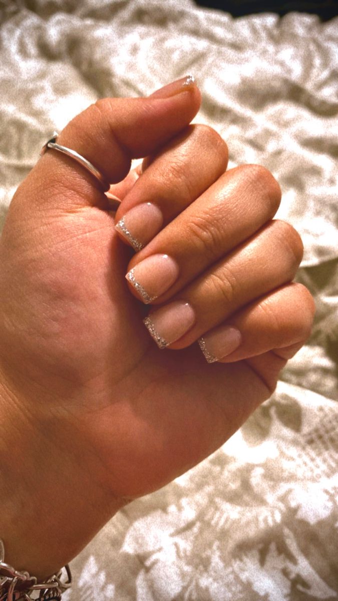 Sophisticated Elegant Nude Nails with Delicate Silver Tips: A Glamorous Touch for Any Occasion