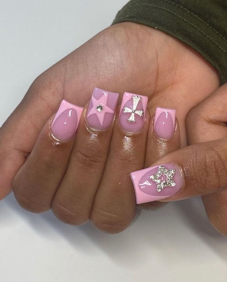 Glamorous Pink Nails with Unique Embellishments for Any Occasion