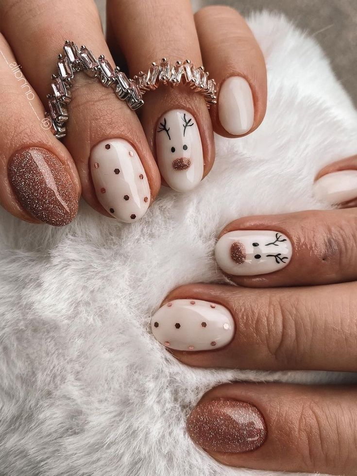 Whimsical Holiday Nail Design: Festive Motifs with Neutral Tones and Elegant Touches.