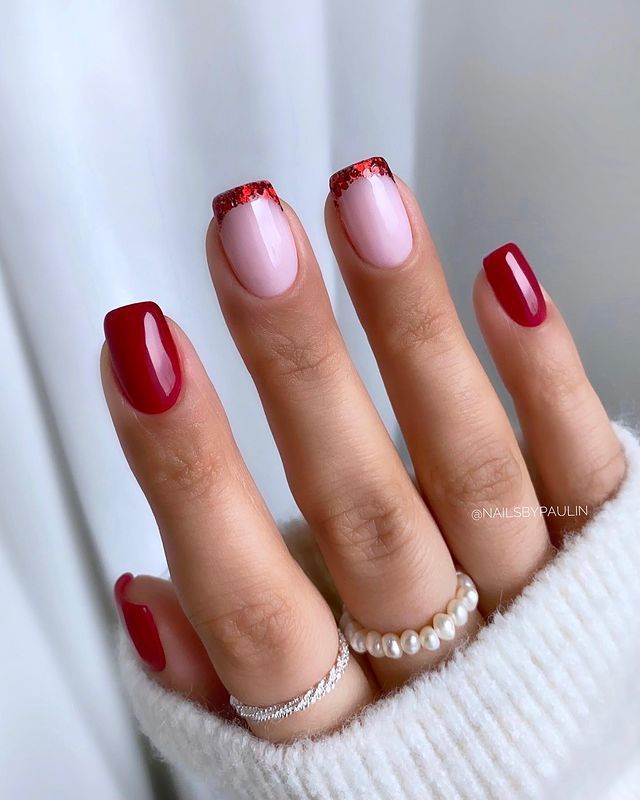 Chic Deep Red and Soft Pink Nail Design with Glitter French Tips.