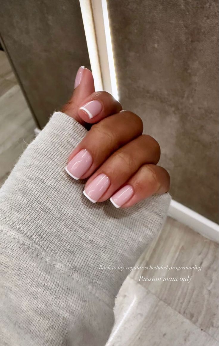 Chic French Tip Manicure: Elegant Soft Pink Base with Crisp White Tips