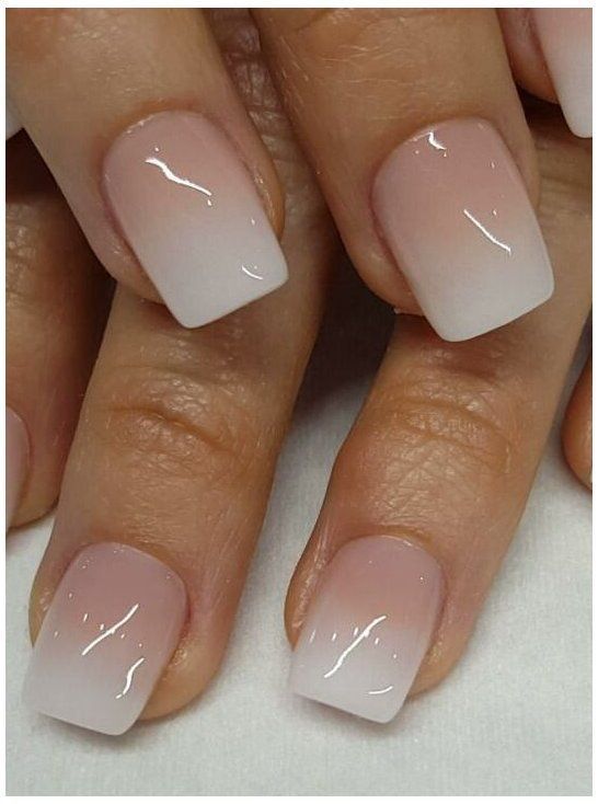 Elegant Ombre Nail Design: Soft Pink and White Gradient with Glossy Finish.