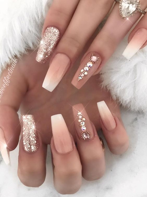 Luxurious Ombre Nail Design: Soft Nude and White Gradient with Rose Gold Glitter and Rhinestones