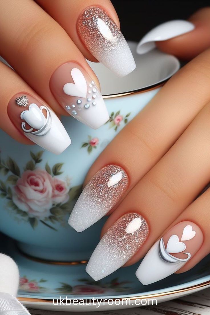 Chic Elegant Nail Design: White and Nude Gradient with Glamorous Sparkle and Romantic Accents.